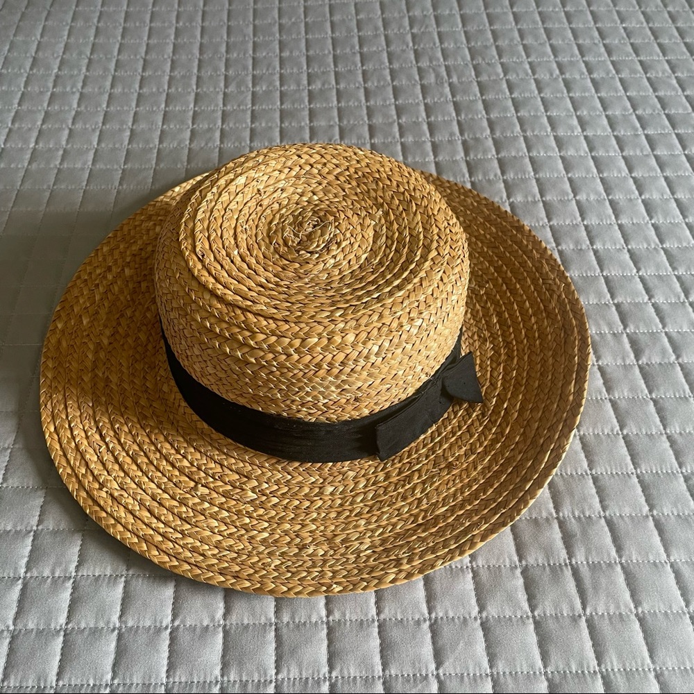 Straw hat with black cloth band